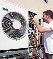 Technician Performing Commercial Refrigeration Repair Modesto with Tools and Equipment