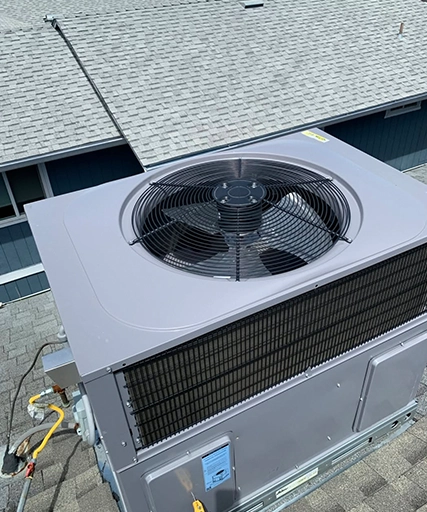 Rooftop Commercial Refrigeration Unit in Modesto, CA on Shingle Roof